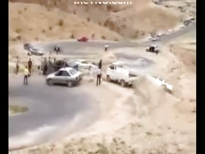 Man in White Pickup Truck pulls up to his Friends and Falls to his Death at the Same Time in Bizarre Accident