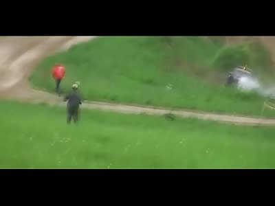 Short video of Female Bystander holding her Umbrella Killed at Rally Race (Watch Slow Motion)