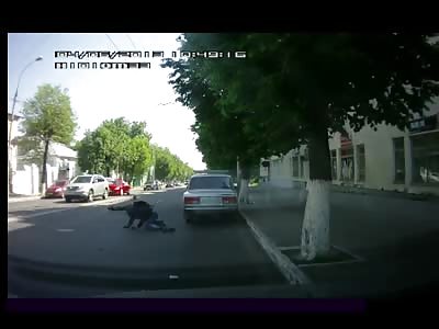 Bike Runs into Pedestrian on the Street....Both Skid on the Pavement for Days