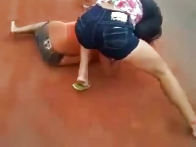 Girl in Orange shirt takes Quite a Beating in Street Fight gets her Teeth Smashed In and then Runs Off
