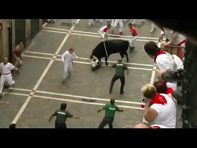 Pinhead Praying for his Life  is Pantsed by a Bull and Gored Badly at the Running of the Bulls in Pamplona
