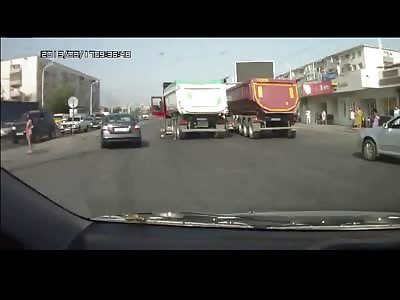 Oblivious or Suicidal Woman walks in Front of Dump Truck is Crushed Horribly 