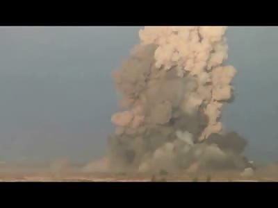 Shockwave from Huge Bomb Sends Camera Man on his Ass...Watch how Long it Takes to Get to Him