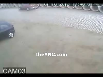 Biker Gets Hit then is Crushed Under Vehicle from Behind 