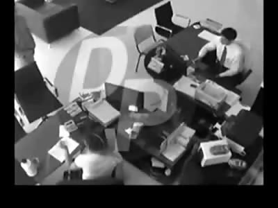 Woman Sitting at her Desk is Shot by Deranged Lunatic