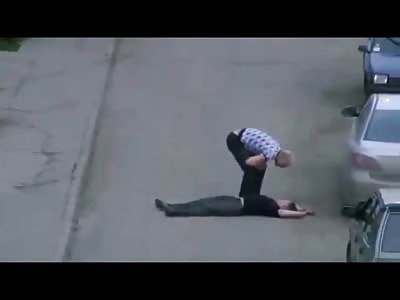 Guy KTFO of Dude then Kindly Drags him out of the Middle of the Street to Avoid Being Runover