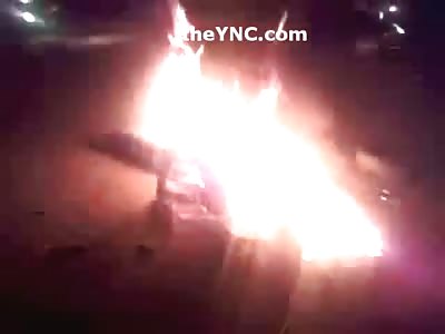 Man is Set Ablaze Screaming  and Burns Alive in Fire Pit as Maniac Mob Laughs at Him...(Watch Full Video) 