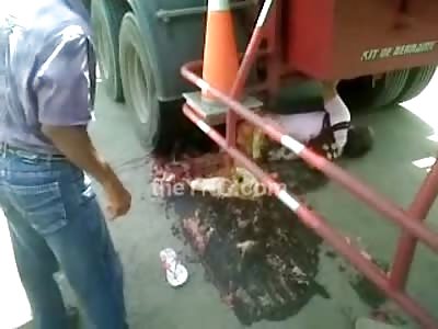Man in Pink Shirts Legs are Torn and Crushed under Truck as he Lays in Agony