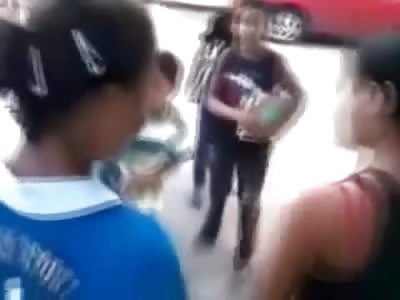 Cute Girl in Black Tank Top takes a Right Hand and cant Recover in Street Fight
