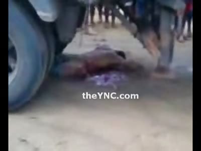 Man lying in his Own Blood still Alive Crushed under Truck