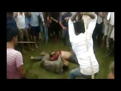 Is Someone Pissed? 2 Accused Criminals are Violently Pounded by Maniac Mob