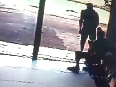 Man gets a ridiculous Beating in the Street caught on CCTV in front of Everyone 