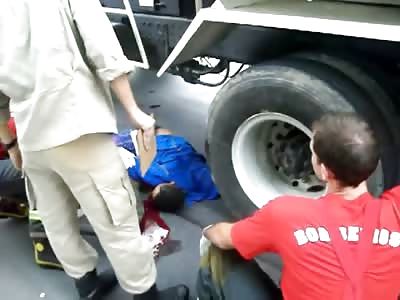 Truck is removed from atop a Biker who Suffocated under the Tire