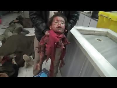 Absolutely Shocking video of Man holding the Remains of a Dead Little Girl after Bomb hit a School (New)