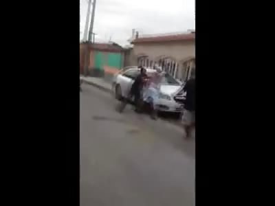 Thief is Beaten while a Woman Tries to Come to the Criminals Rescue 