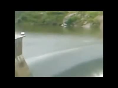 Man Swims out to his Death in this Suicide by Waterfall Dam