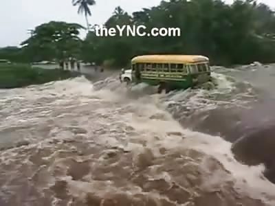 Horrible Accident Shows Bus is Caught on a Flood Tipping over and Being Washed Away