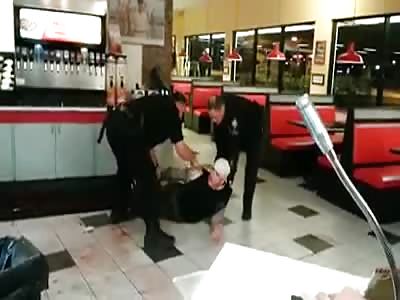 Man Fights Two Police Officer in Fast Food Joint.....Gets Tasered and Dies!