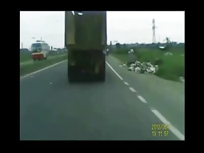 Trying to Pass a Dump Truck on the Right Side Proves Fatal