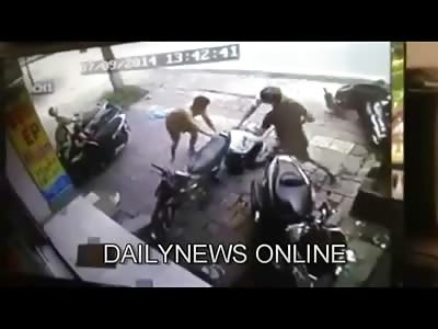 Scooter Thief is Caught mid Theft and is Beaten Like a Wild Animal