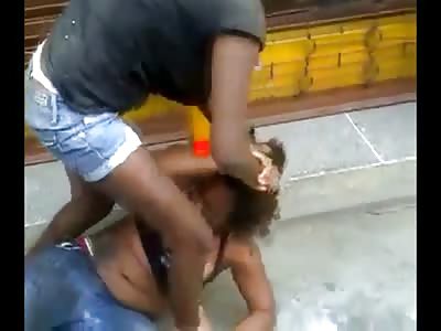 Woman Fight Ends with One Face being Rubbed in Dirty Sewage in the Street