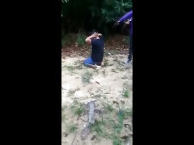 Man on his Knees is Executed by his Female Ex-Partner in Crime, the Gun Jams Twice before Fatal Head Shot 