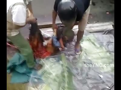 True Gore: Female and Male People Crushed by Truck are Picked Off of the Road in Front of Children 