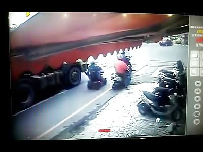 Woman in Handicap Scooter is Run Over by Large Truck