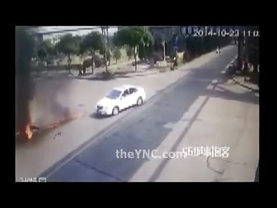 Motorcyclist Engulfed into Flames after Hitting Car at Intersection 