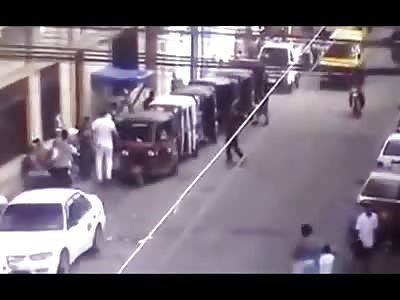 Man in White Holding a Baby is Executed from the Back at Point Blank Range