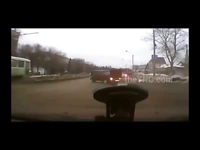 Man in Tiny Red Car Ejected Like a Rag Doll after Terrible Collision 