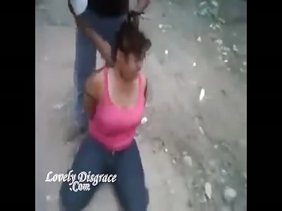 Los Zetas beaheading a woman.