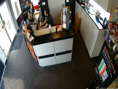 Asshole violently punches girl in the face then proceeds to rob a Boost Mobile store