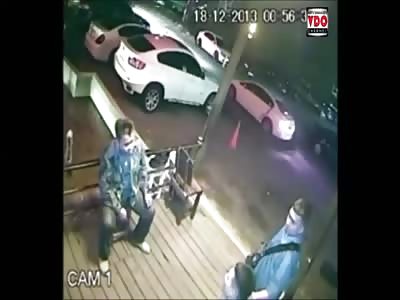 Man Casually Chatting With His Friends is Shot in the Back by Rival