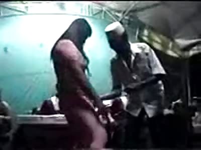 Indonesian Slut Dancing While a Man Rubs Money in Her Cunt