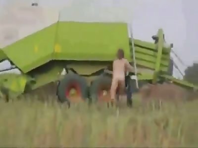 Man tuns into a bale of hay