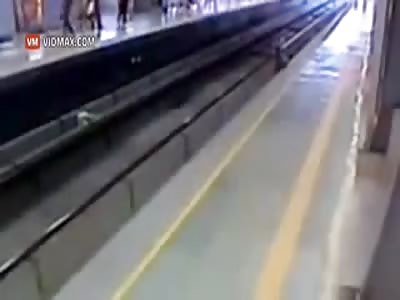 Horrible Death:  Man Gets Stuck on Train Tracks at Station, Nobody Helps 