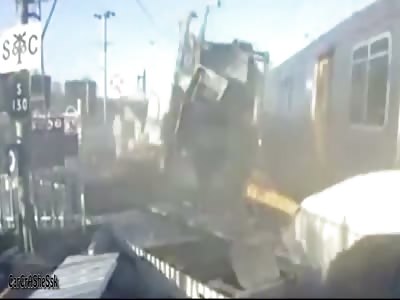 Train slams into truck and giant transformer on tracks  