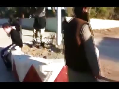 New: ISIS or Daash or Whoever they are Execute a KID on a Curb 