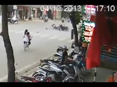 Bikers Collide in a a Sliding Accident
