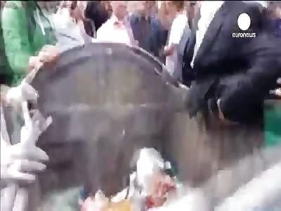 Angry mob throws Ukraine MP in rubbish bin.