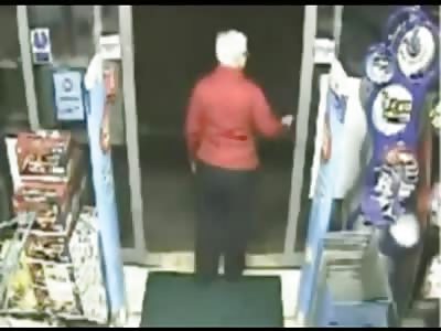 Woman shop assistant prevents robbery.