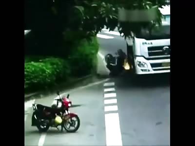 Motorcyclist set on fire after lorry crash