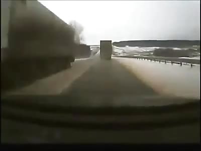 Dash cam view of two trucks colliding