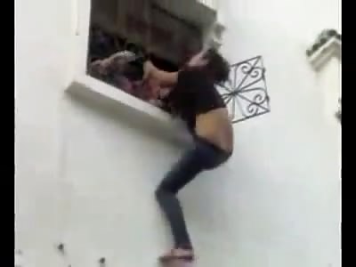 Screeming Moroccan Girl Tries to Commit Suicide by Jumping Out of Window