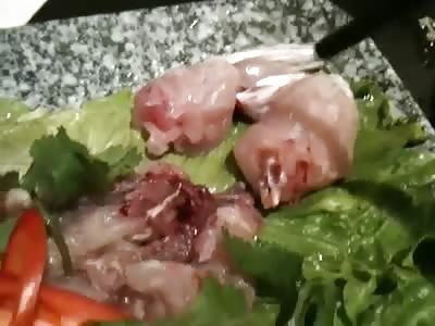 WTF - Skinned and Beheaded frogs still screaming on the dinner plate