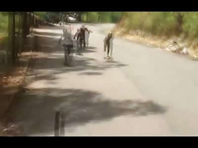 Group of Moronic Kids Decide to Skate down a Mountain Road... Of Course One gets Hit by Oncoming Traffic