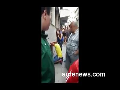 Angry Woman Kicks Robber in the Face and is Applauded by Crowd