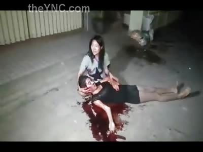 Pretty Girl Holds her Dying Friend in her Lap as She Bleeds Out in Agony