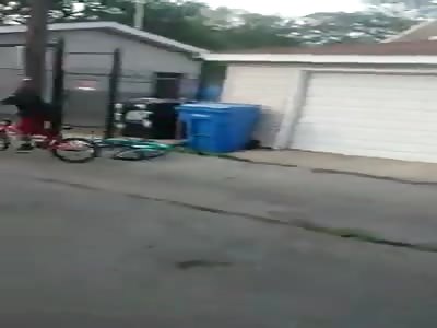 BLACK KID JUMPS OFF BIKE, PUNCHES KID, AND GETS BACK ON BIKE. (Best punch of 2014)